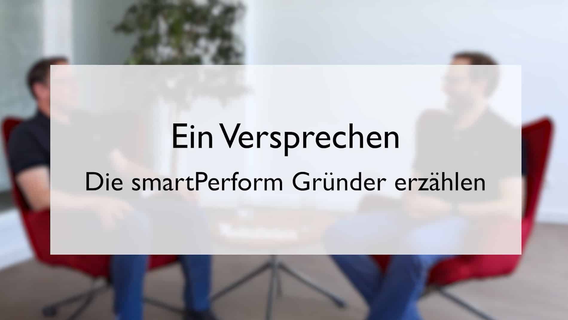 Unterhaltung zwischen zwei Personen in einem Bürosetting.